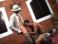 A gay planter sodomizes his slave