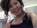 Miranda strips in her kitchen in front of her webcam