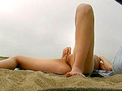 A voyeur films a college girl on the sly on a nudist beach xxx video